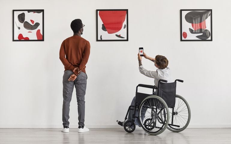 people looking at art