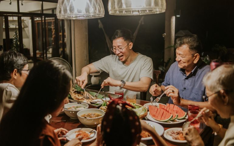 Local Thai-Chinese family having party dinner-stock photo