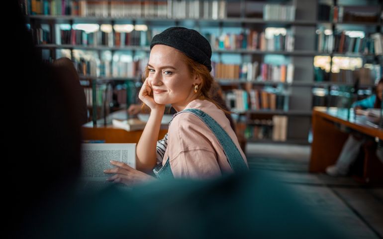 woman looking to the side with smile