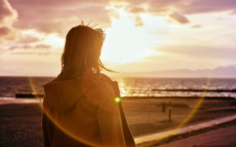 Portrait of young woman on beach