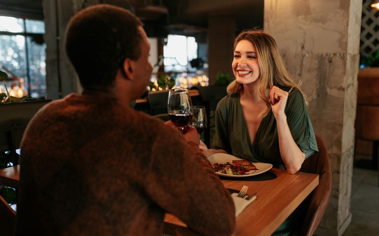 Happy woman on date with boyfriend.