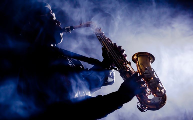 African jazz musician playing the saxophone