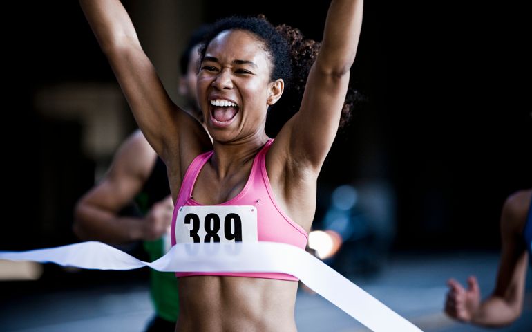 Runner crossing the finish line