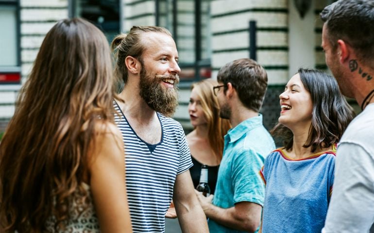 A Group Of Friends Meeting Together At Barbecue