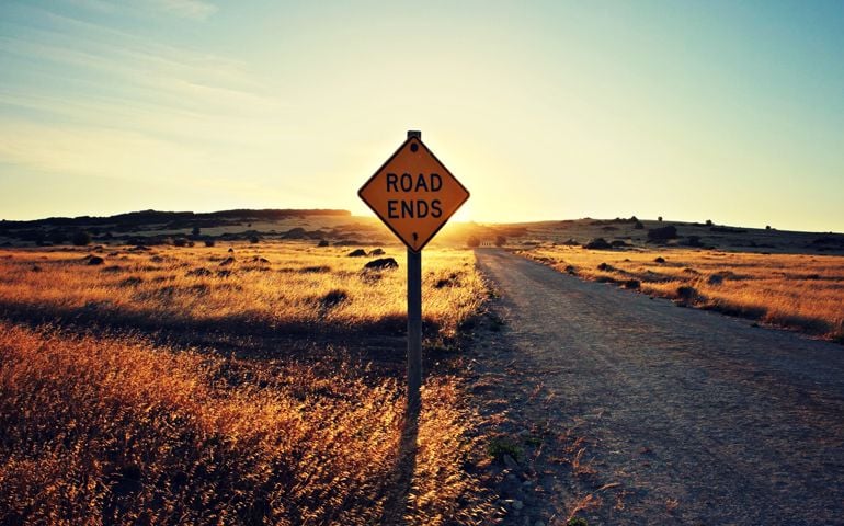 Road end sign on remote dirt road at sunset, Kangaroo Island, South Australia, Australia