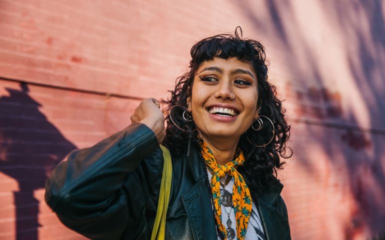 Young confident woman smiling