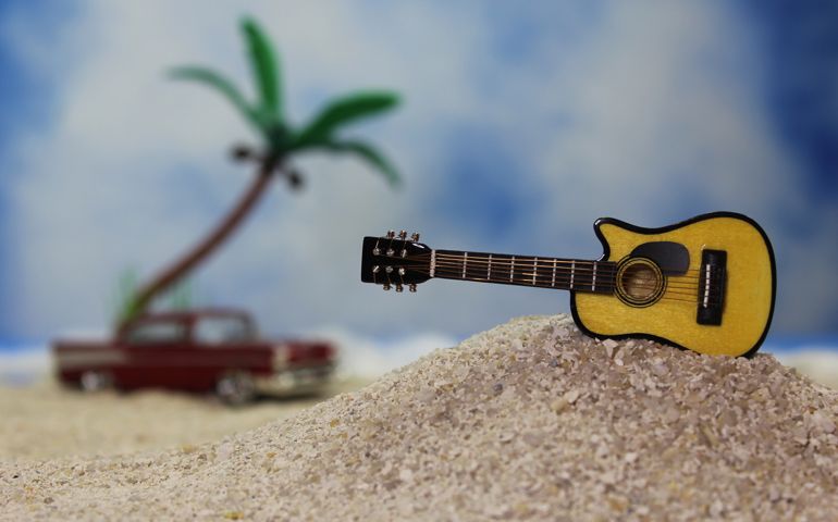 Acoustic Guitar on Tropical Beach With Vintage Hot Rod