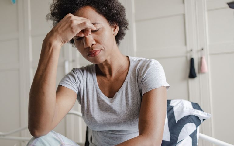 Unhappy African-American woman suffering from depression