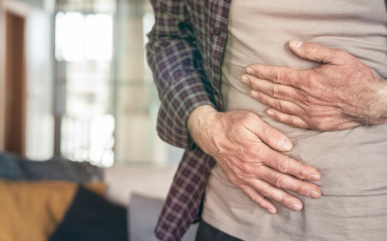 Senior man is suffering stomach pain