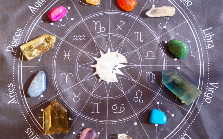 Healing crystals on brown background
