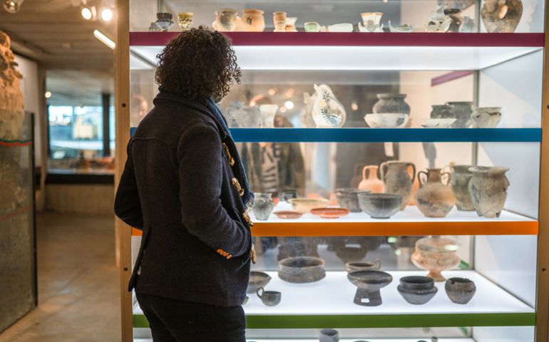 Visitor and Ancient Pottery