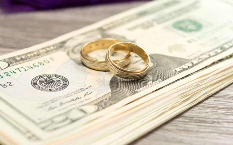 Wedding rings and cash