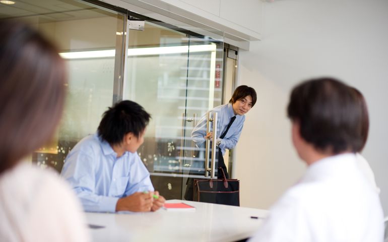 man coming late to work