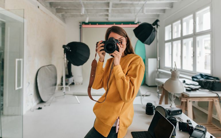Photographer working in a studio