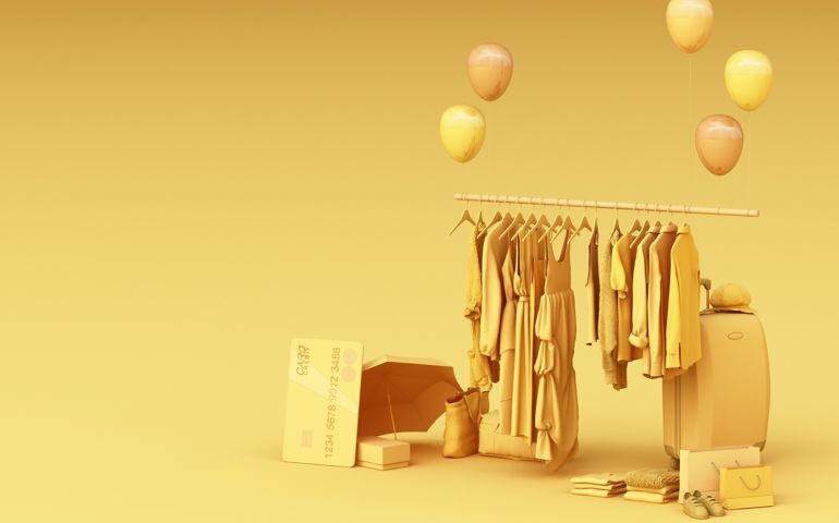 Clothes on a hanger surrounding by bag and market prop with credit card on the floor. 3d rendering