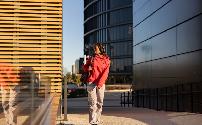 young african american student woman in the city