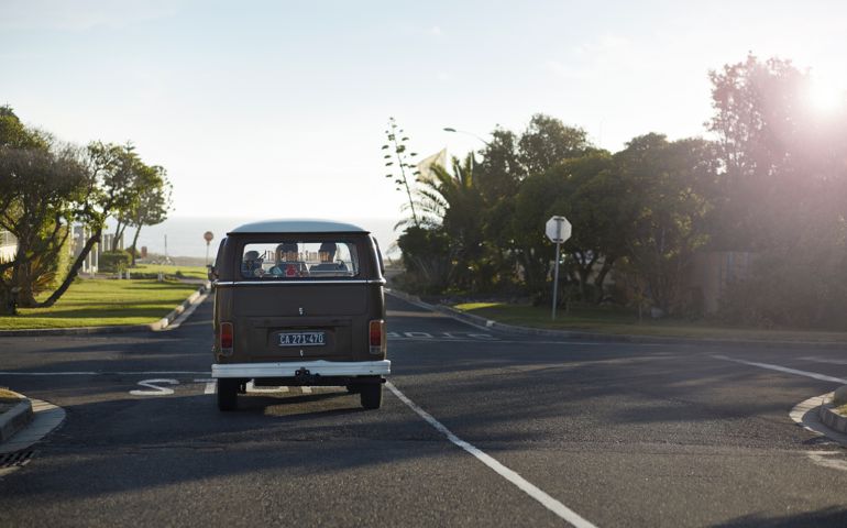 Old camper van at sunrise