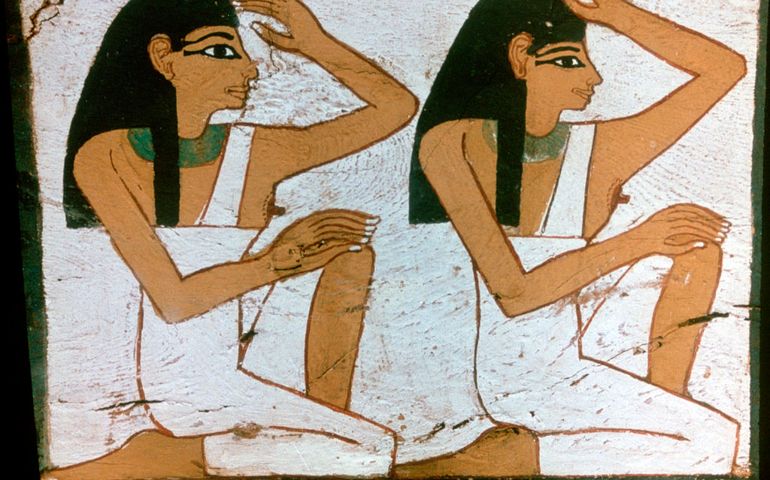 'Two Mourners', detail of the decoration of a sarcophagus of The Lady of Madja, 18th Dynasty.