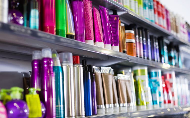 Shelves with hair care products in a cosmetics showroom indoor