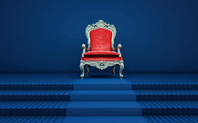 Red royal chair on a blue background, VIP throne, Red royal throne