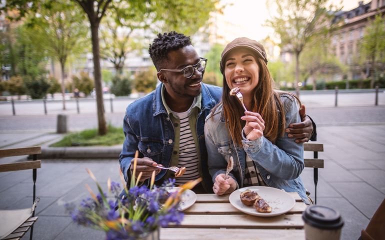 Couple on date at outside coffee shop
