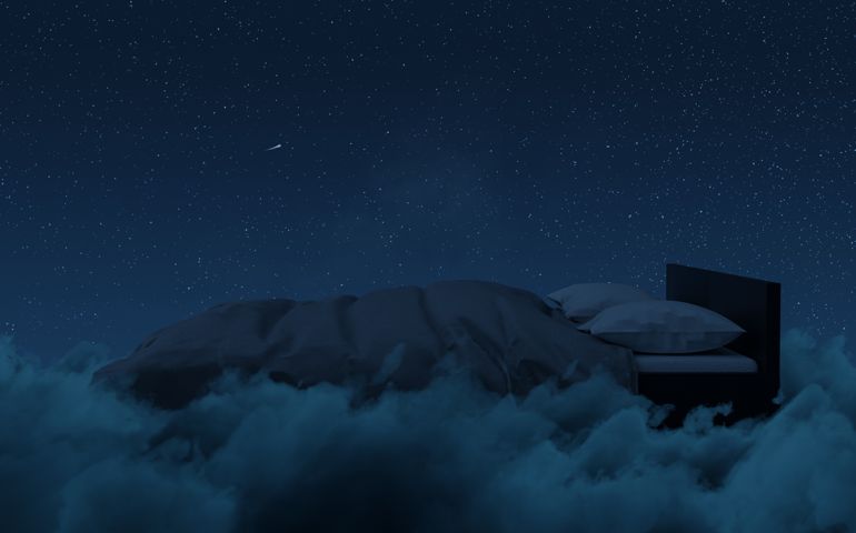 3d rendering of cozy bed over fluffy clouds at night