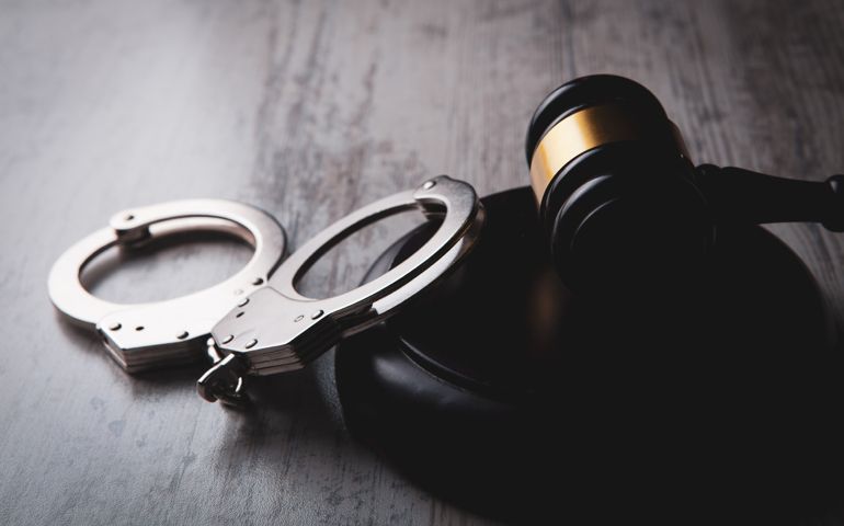 Legal law concept image - gavel and handcuffs