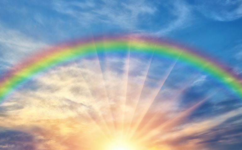 Beautiful evening sunset with rainbow