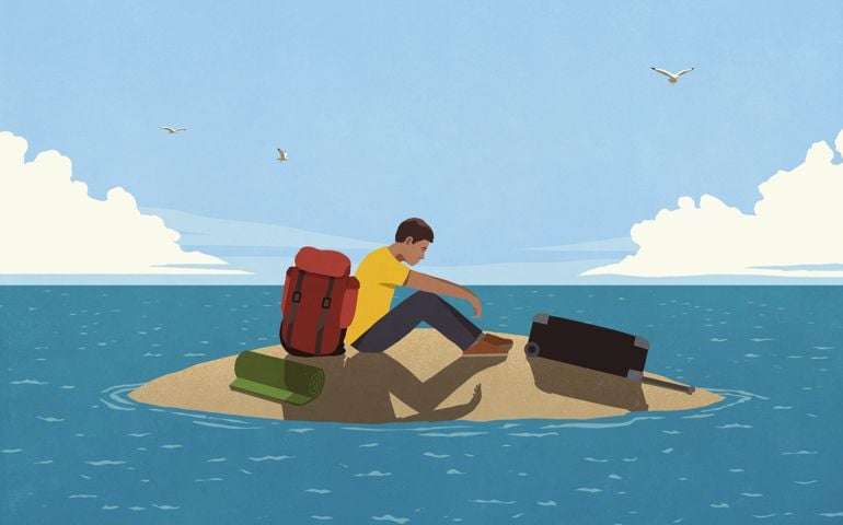 Tired man with luggage stranded on ocean island
