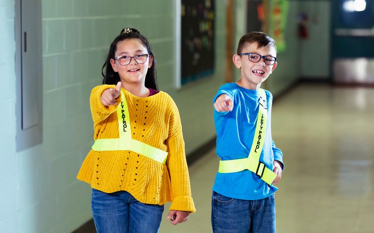 Elementary students on school safety patrol