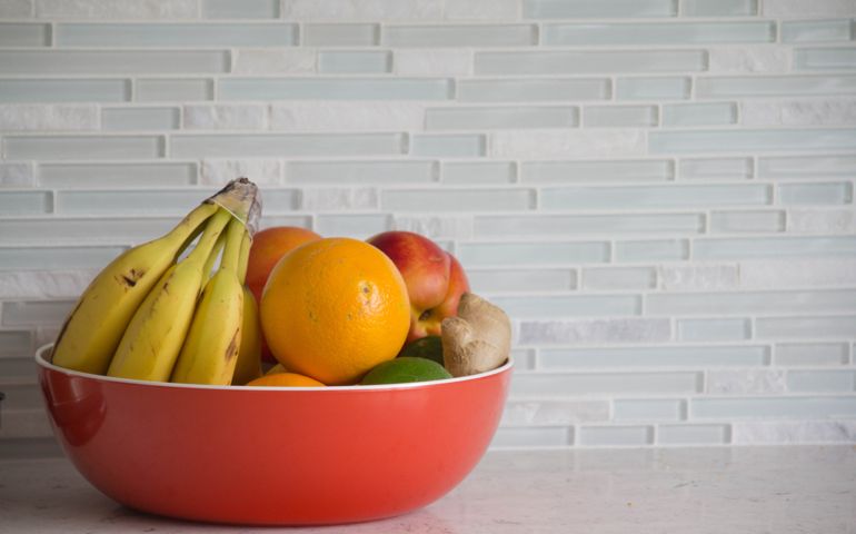 Fresh fruit in red bowl