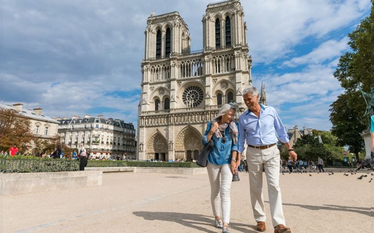 Happy seniors in Paris, having a wonderful vacation