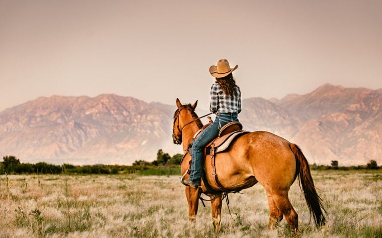 Cowgirl Horseback Riding