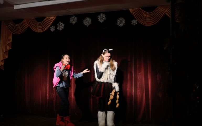 Theatrical school, a teenage girls plays the role of a witch in a fairy tale