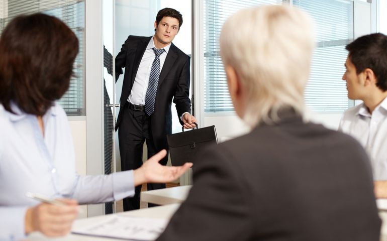 person coming in late interrupting