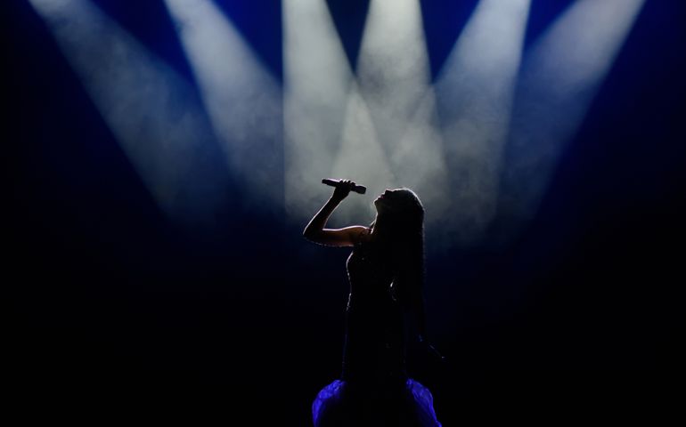 Singer in silhouette