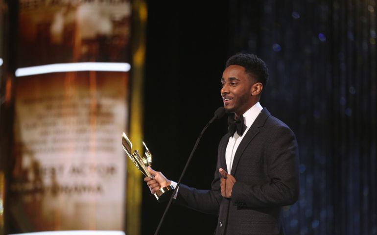 TORONTO, ONTARIO, CANADA - MARCH 11, 2018: Canadian Screen Award winner Nabil Rajo accepts his Best Actor award.