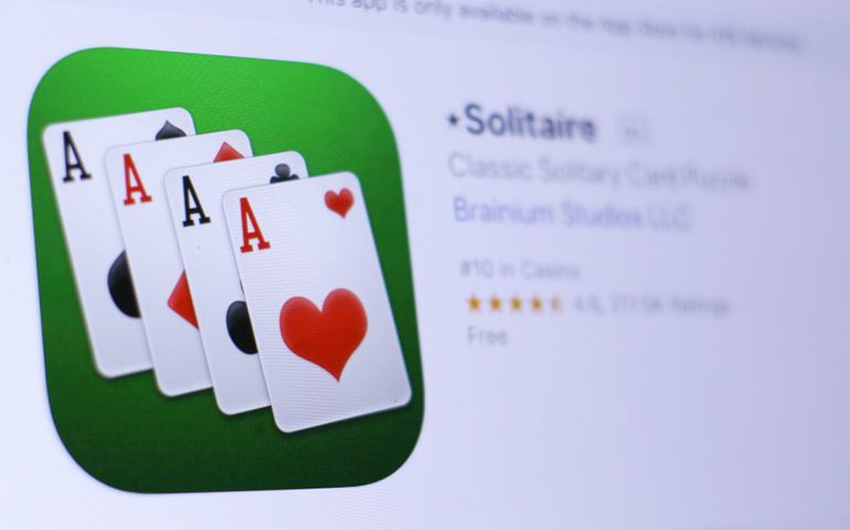 JEMBER, EAST JAVA, INDONESIA, JUNE 07, 2018. ?Solitaire app in play store. close-up on the laptop screen.