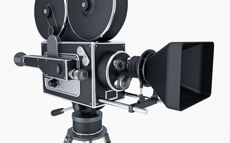 Illustration of movie camera isolated on white