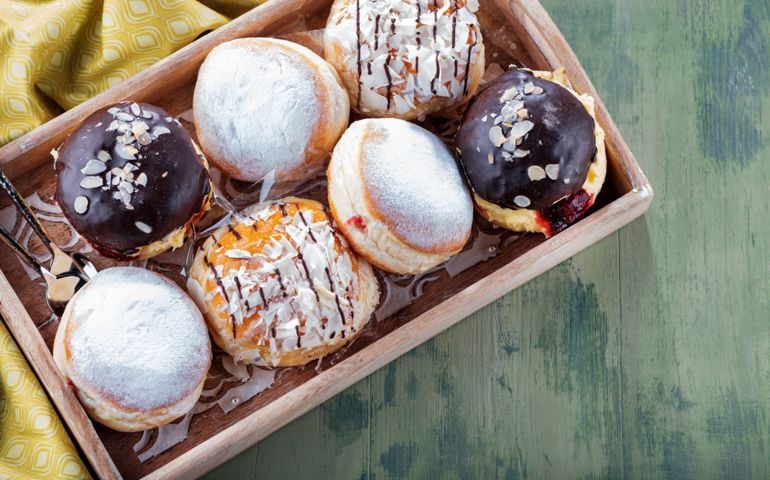 German donuts - krapfen or berliner - filled with jam