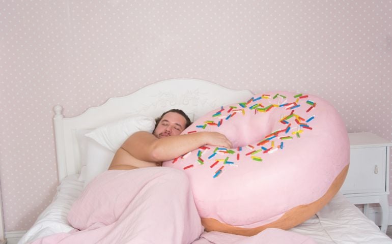Funny man and donut