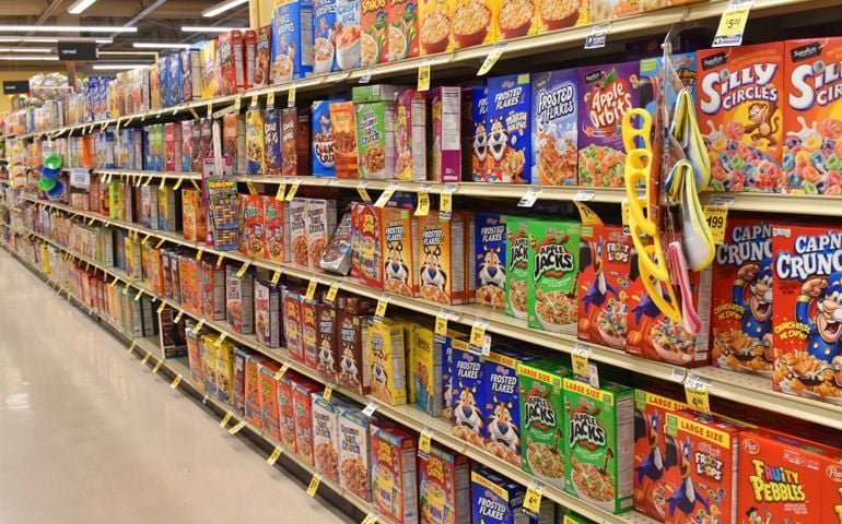 Alameda, CA - May 07, 2019: Grocery store shelf with boxes of cereal, various brands and flavors. Cereal is a popular breakfast food especially for children.