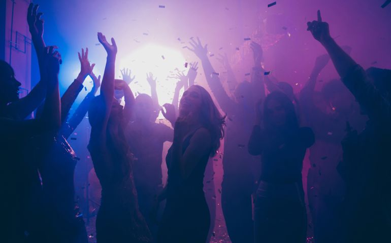 Nice attractive stylish cheerful cheery positive carefree guys ladies having fun hanging out best summer year student festive in new cool bar modern place indoors