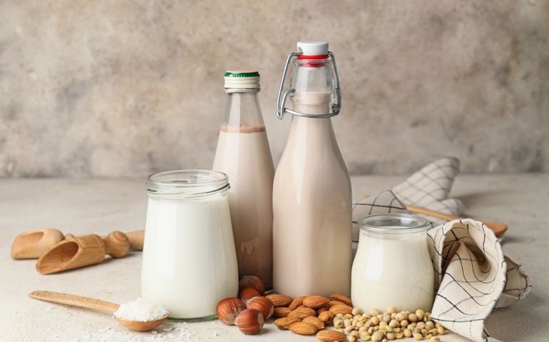 Different milk on light background