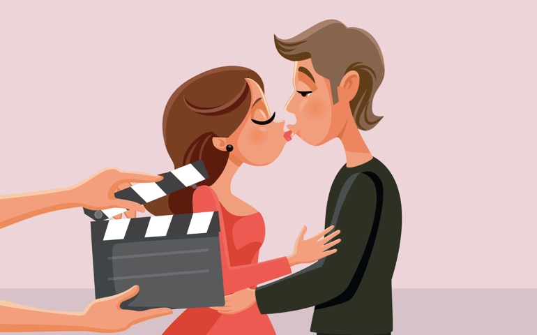Actors on Set Filming a Romantic Movie. Actress kissing her co-star in a love flick