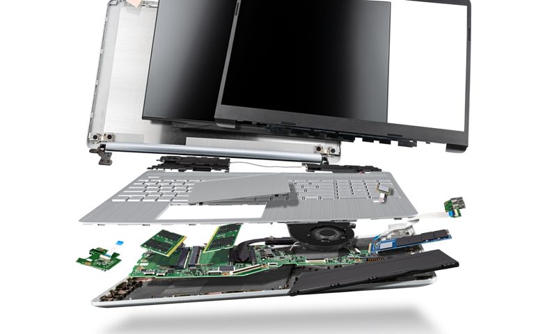 flying parts of a notebook computer. hardware components mainboard cpu processor display RAM cables and cooling fan flying out of silver laptop PC case isolated on white exploded view background