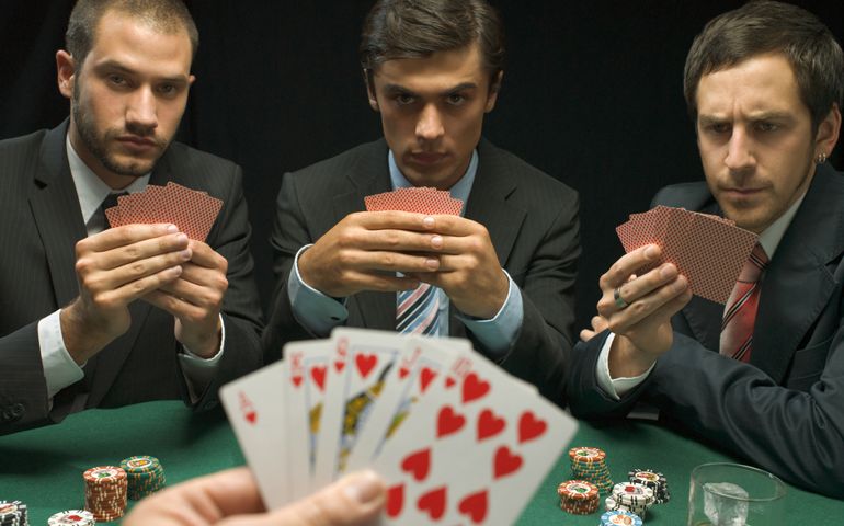 Men playing poker