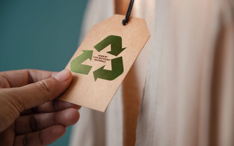 Recycling Products Concept. Organic Cotton Recycling Cloth. Zero Waste Materials. Environment Care, Reuse, Renewable for Sustainable Lifestyle. Recycle Icon show on Tag