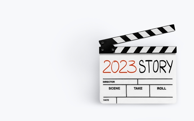 2023 story. handwriting on film slate or movie clapboard.Happy new year film industry.