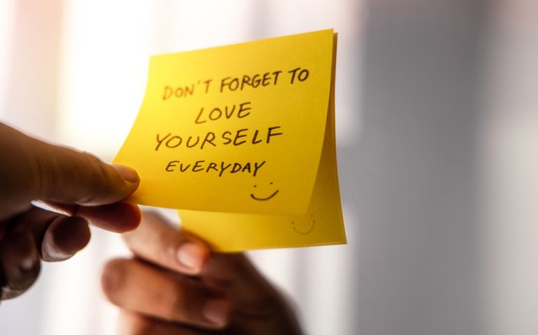Love Yourself Concept. Note on the Mirror with Good Quote.